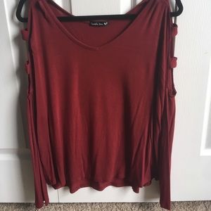 Burgundy top with cutouts on shoulders